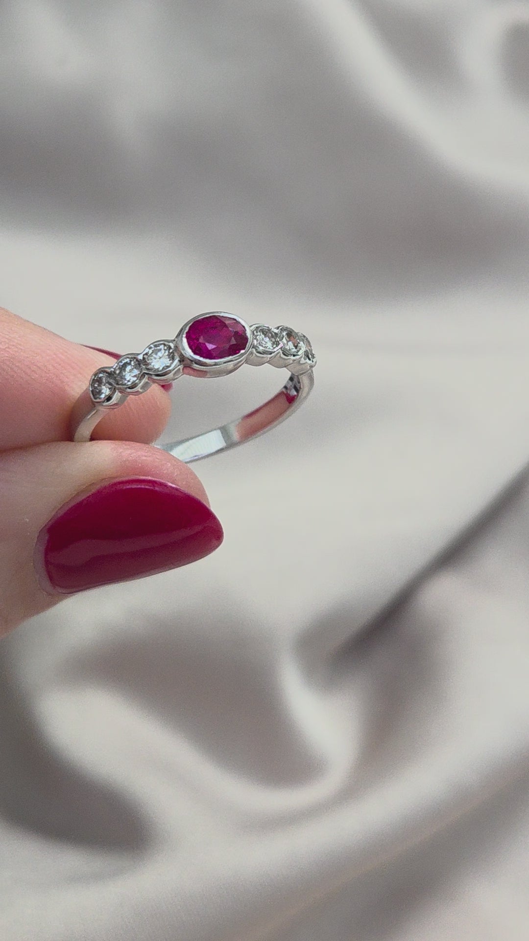 Oval Ruby and Diamond Seven Stone Ring