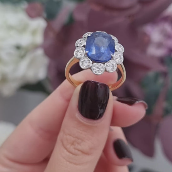 4.62ct Oval Sapphire and Diamond Cluster Engagement Ring