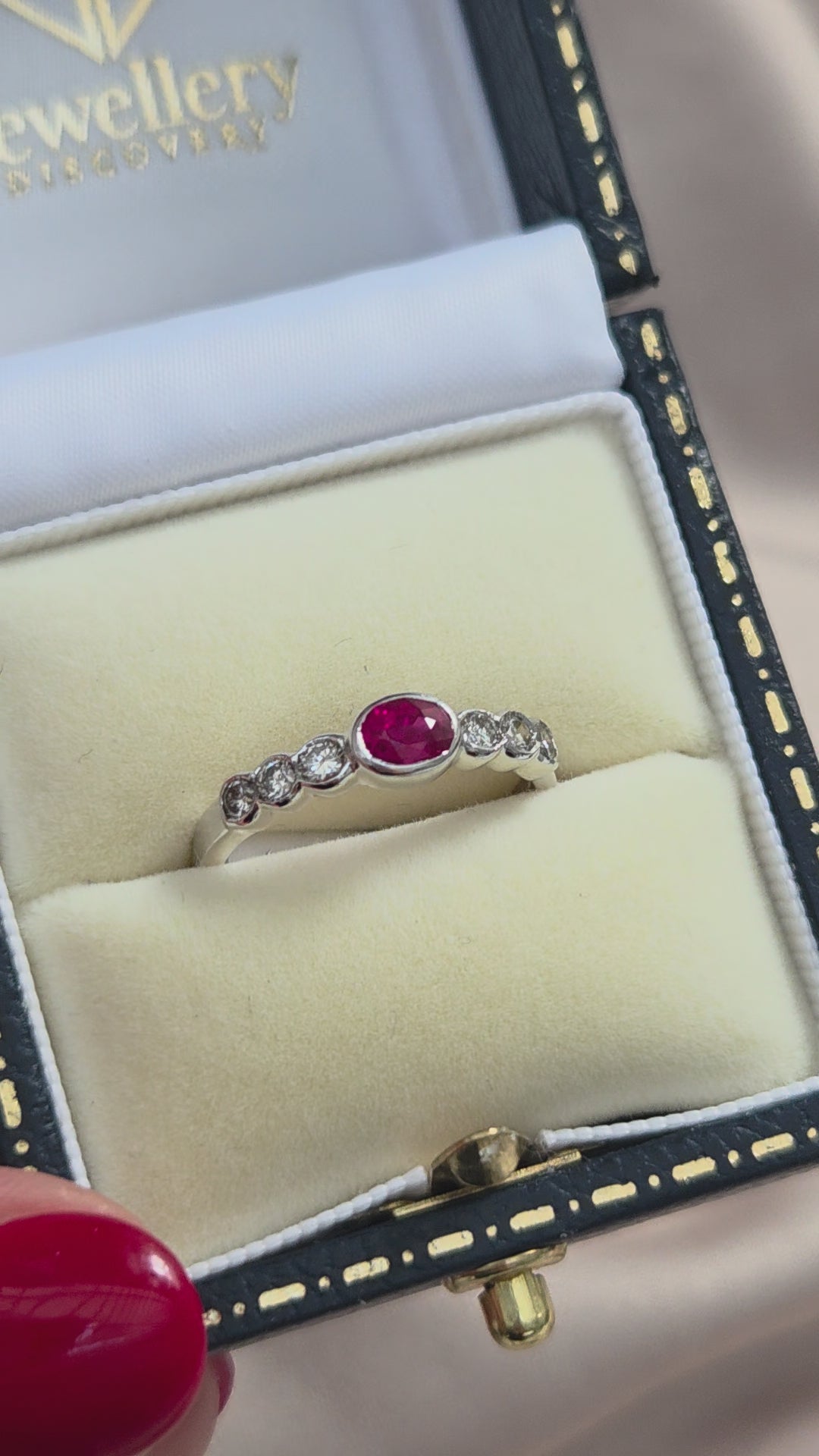 Oval Ruby and Diamond Seven Stone Ring
