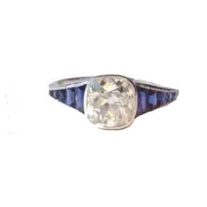 Art Deco sapphire and diamond ring Calibre cut sapphire shoulders platinum cushion cut 1 carat