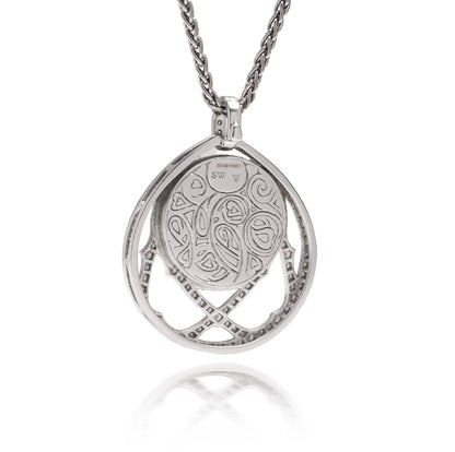 A white gold pendant, engraved on the back, with a white gold chain