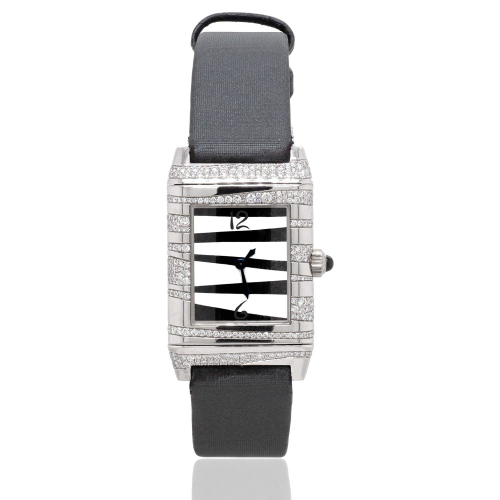 Jaeger LeCoultre Grand Reverso Serti Neige 18ct White Gold Watch with quartz movement, and a diamond set case. Comes with its original box. Circa 2005