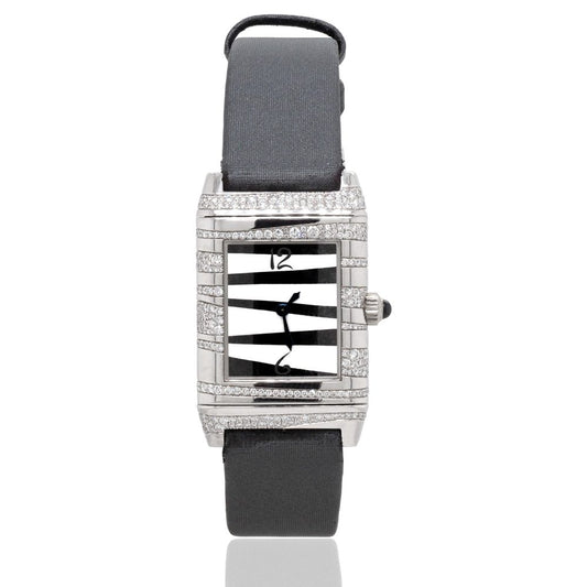 Jaeger LeCoultre Grand Reverso Serti Neige 18ct White Gold Watch with quartz movement, and a diamond set case. Comes with its original box. Circa 2005
