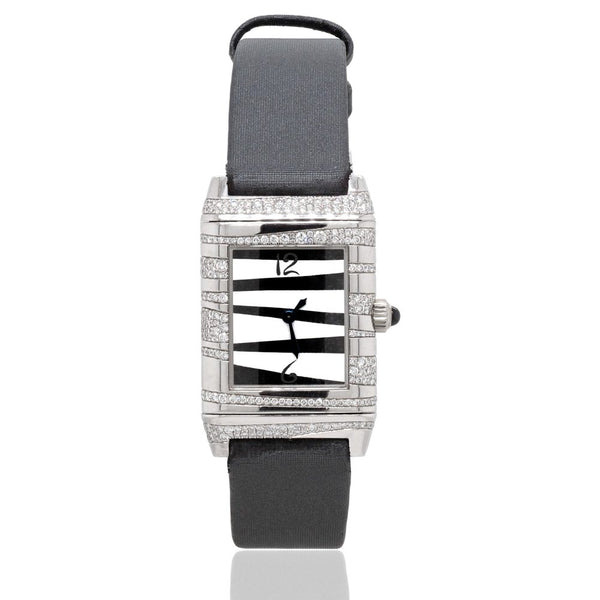 Jaeger LeCoultre Grand Reverso Serti Neige 18ct White Gold Watch with quartz movement, and a diamond set case. Comes with its original box. Circa 2005