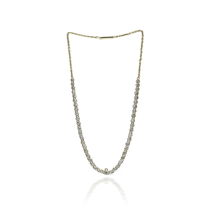 An antique diamond riviere necklace in yellow gold