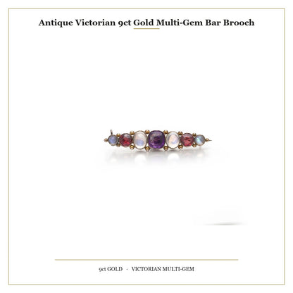 A cabochon multi-gemstone bar brooch in yellow gold, with measurements