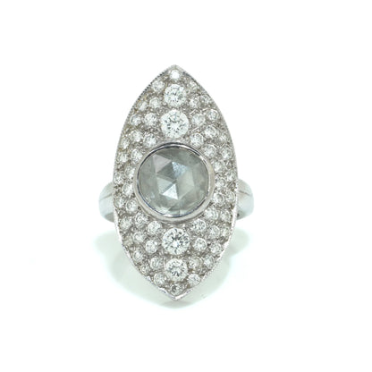 A marquise shaped diamond cluster ring with a central rose cut diamond, in white gold