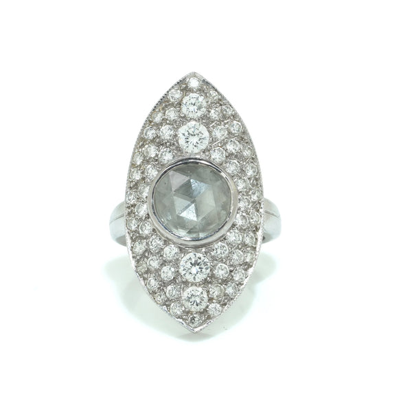 A marquise shaped diamond cluster ring with a central rose cut diamond, in white gold
