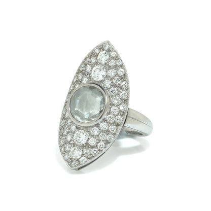 A marquise shaped diamond cluster ring with a central rose cut diamond, in white gold