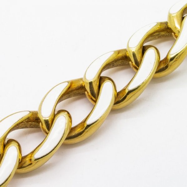 Vintage Enamel and Gold Curb Link Bracelet; chunky 18ct gold hollow curb link chain, decorated with white enamel on the flat top edges. Circa 1960