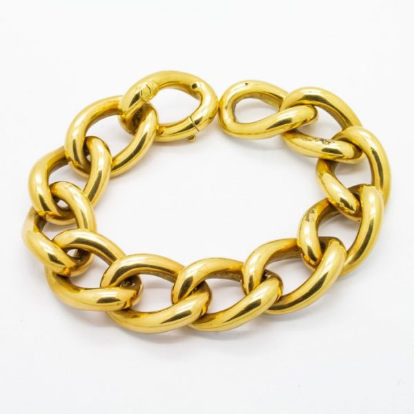 Vintage Enamel and Gold Curb Link Bracelet; chunky 18ct gold hollow curb link chain, decorated with white enamel on the flat top edges. Circa 1960