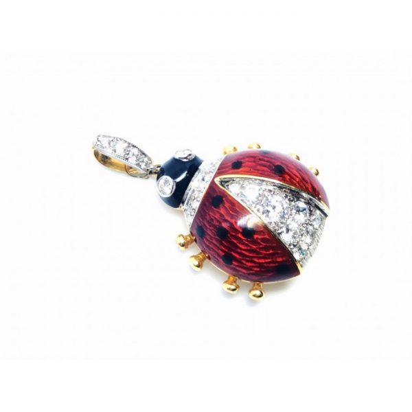 Red Enamel, Diamond and Gold Ladybird Pendant; red guilloche enamel with black dots and black head, set with 0.94cts round brilliant-cut diamonds. Mounted in gold, with a diamond set loop