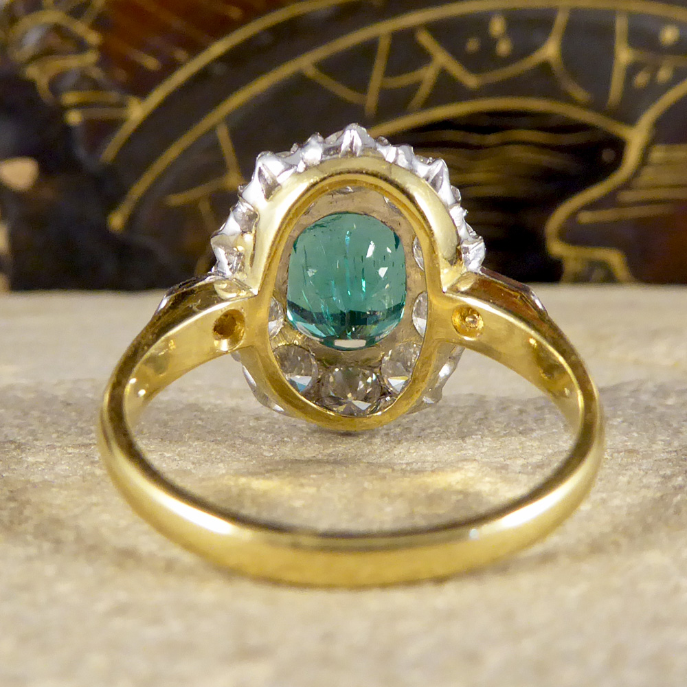 Vintage Emerald and Diamond Cluster Engagement Ring