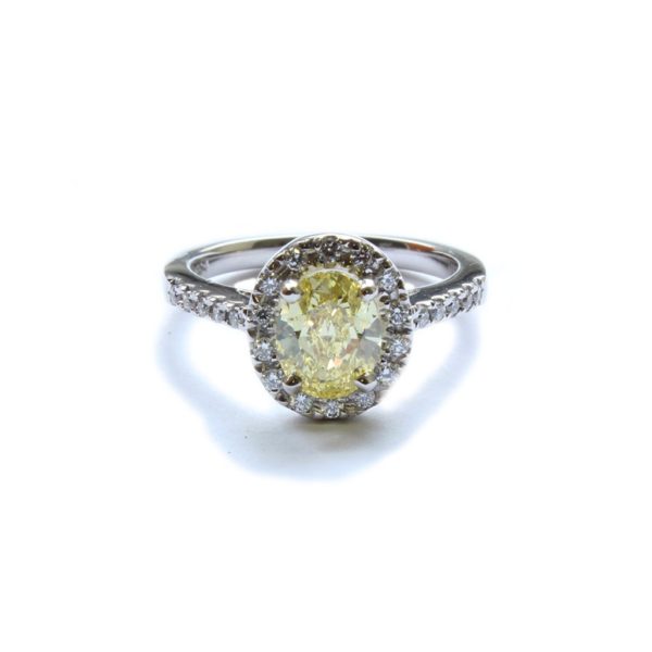 Platinum Oval Yellow Diamond Cluster Ring