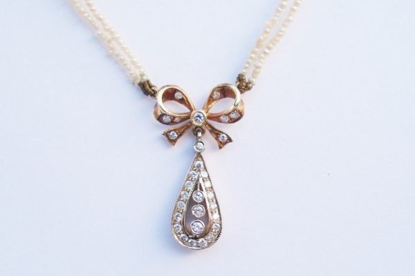 Antique Art Deco Diamond and Pearl Bow Pendant