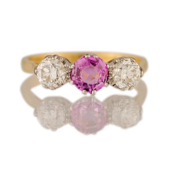 Antique Pink Sapphire and Old-Cut Diamond Trilogy Ring, 0.60 carats, 18ct yellow gold