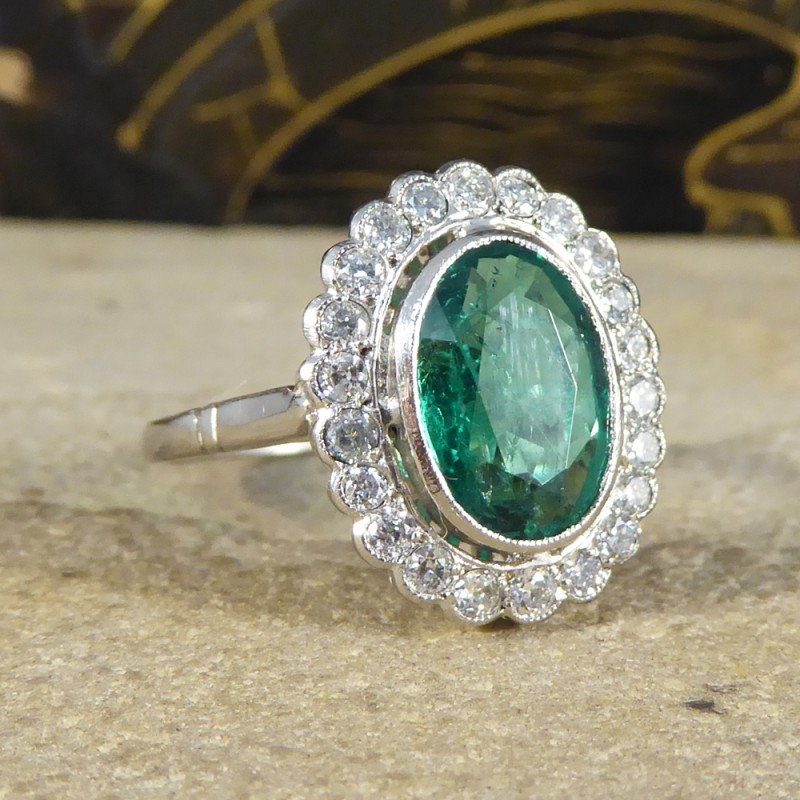 1.45ct Oval Cut Emerald and Diamond Cluster Ring - Jewellery Discovery