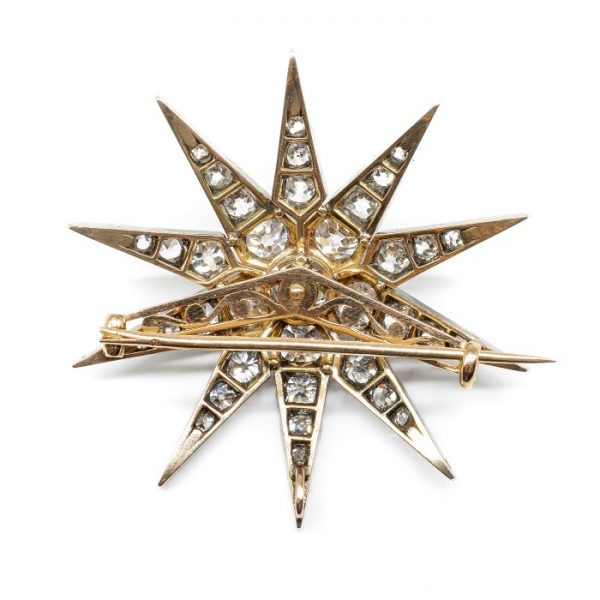 FRENCH ANTIQUE DIAMOND SILVER AND GOLD STAR BROOCH