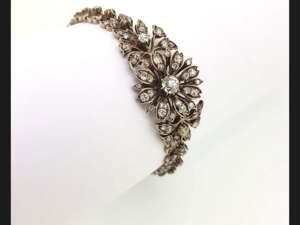 Exquisite antique Victorian diamond bracelet set with old cut diamonds in an intricate floral pattern, Set in silver and gold