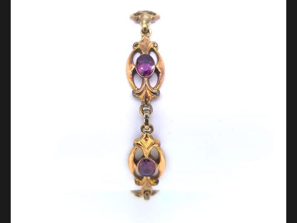 Victorian Almondine Garnet Bracelet; Purple almondine garnets set in 9ct yellow gold link bracelet