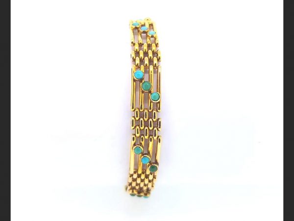 Victorian turquoise gate braclet, links set with a trio of cabochon turquoises,15ct yellow gold