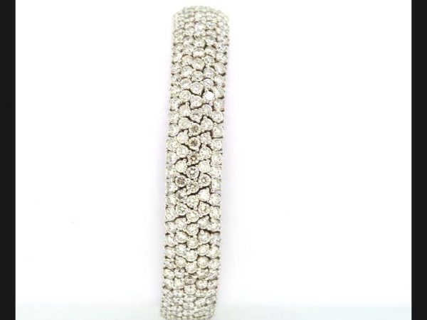 Pave set diamond bracelet; Flexible setting; estimated 18.00ct total, colour G, clarity VS1; set in 18ct white gold, 22g