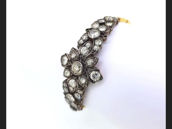 Antique Old-Cut Diamond Bracelet, set with 6.00 carats old-cut diamonds in a delicate floral pattern, set into silver on a high carat bracelet