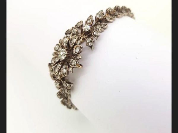 Victorian diamond bracelet set with old cut diamonds in an intricate floral pattern, Set in silver and gold