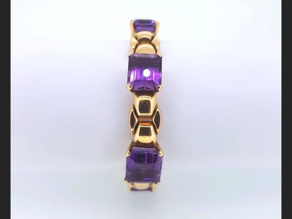 Amethyst bracelet, set in a solid knot design 18ct yellow gold bracelet, circa 1940's