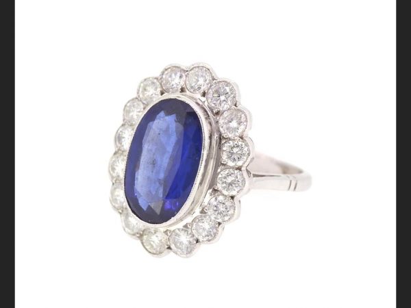 Vintage Sapphire and Diamond Cluster Ring, gemstones totaling 5.66 carats, 18ct white gold