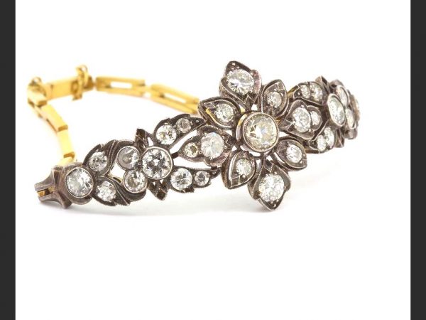 Antique Old-Cut Diamond Bracelet, set with 6.00 carats old-cut diamonds in a delicate floral pattern, set into silver on a high carat bracelet
