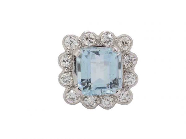 Aquamarine and diamond cluster ring step rectangular cut shape