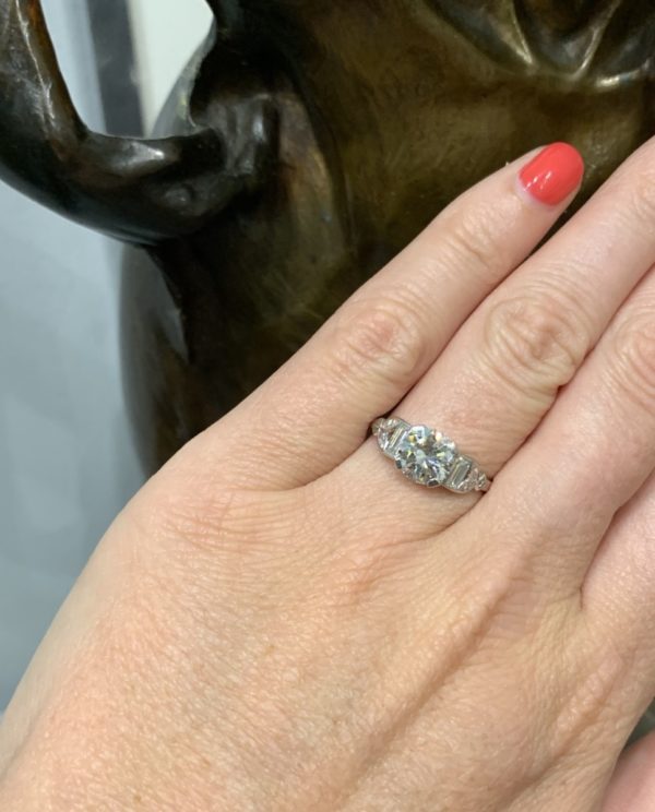 Art Deco diamond engagement ring platinum 1930 on finger round transitional cut diamond