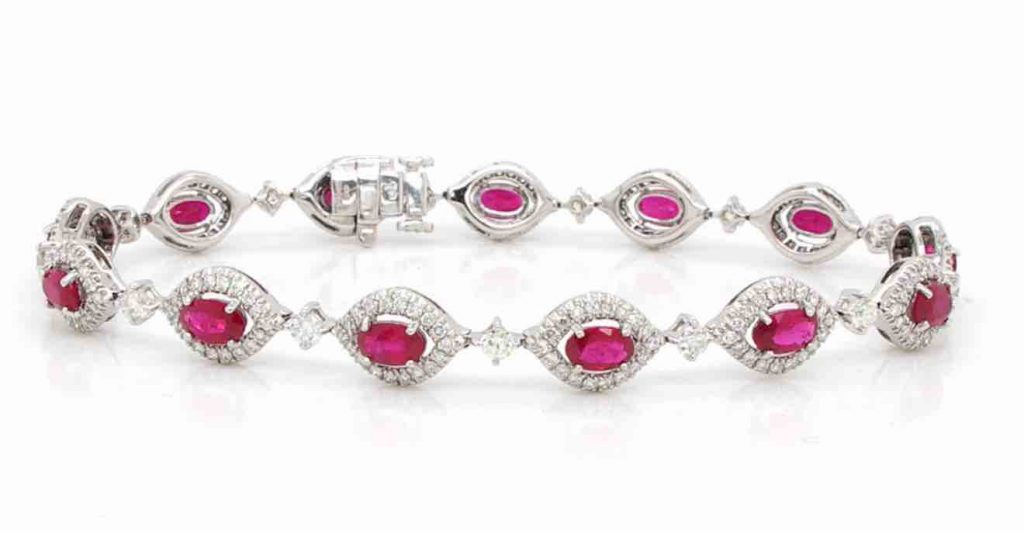 Oval Cut Ruby and Diamond Cluster Line Bracelet | 18ct white gold