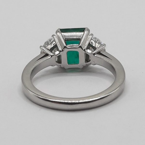 2ct Emerald and Half Moon Diamond Platinum Ring