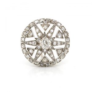 Antique Edwardian 2.50ct Diamond Star Circular Target Brooch; central round diamond extends out to diamond set star-shaped design within a circular halo, in silver and 15ct gold, Circa 1910