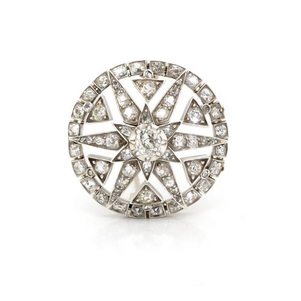 Antique Edwardian 2.50ct Diamond Star Circular Target Brooch; central round diamond extends out to diamond set star-shaped design within a circular halo, in silver and 15ct gold, Circa 1910