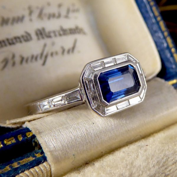 Emerald Cut Sapphire and Diamond Cluster Ring in Platinum