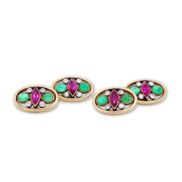 Antique Edwardian Diamond Ruby and Emerald set Cufflinks, each set with one marquise cut ruby, two cabochon emeralds and four old cut diamonds, 18ct yellow gold, gold chain fastenings, Circa 1910. 