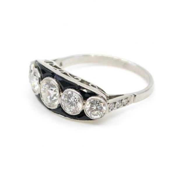 Vintage Diamond, Onyx and Platinum Five-Stone Ring, 1.25 carat total