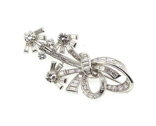 Vintage 1950's Diamond Floral Spray Brooch, 3.50cts, in Platinum; An unusual vintage diamond floral brooch set with baguette and brilliant-cut diamonds.