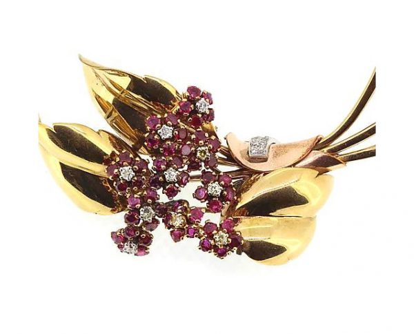 Vintage 1940's Ruby and Diamond Floral Spray Brooch in 14ct Yellow Gold; Each flower has a central diamond with ruby set petals. Circa 1940's.