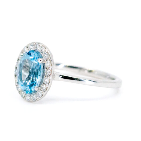 Oval Aquamarine And Diamond Cluster 18ct White Gold Ring
