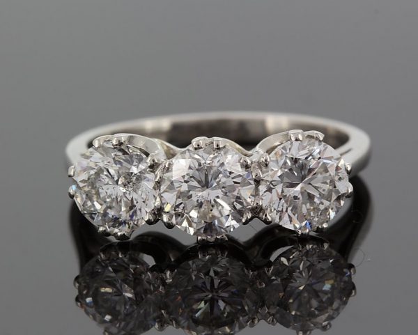 diamond three stone engagement ring 3 carats round stones platinum claw