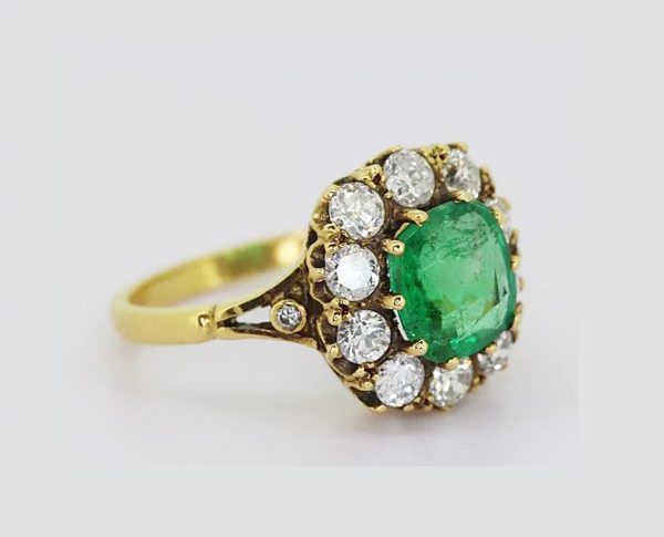 Antique 2.05ct Cushion Cut Emerald and 1.10ct Old Cut Diamond Cluster Ring, mounted in 18ct yellow gold.