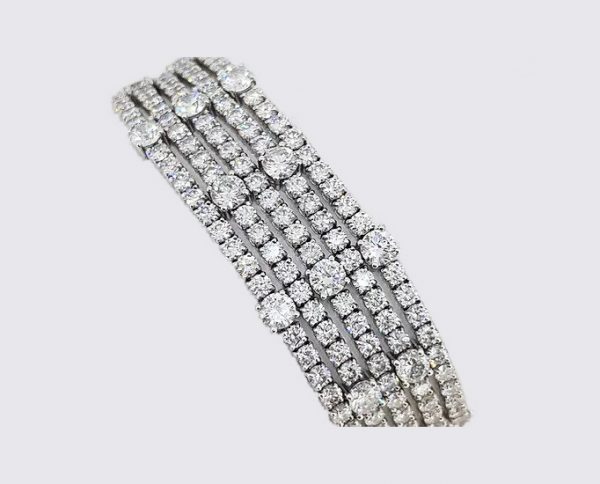 31.50ct Diamond Five Line Bracelet; stunning five-line diamond bracelet set with G colour round brilliant-cut diamonds totaling 31.5cts, in 18ct white gold.