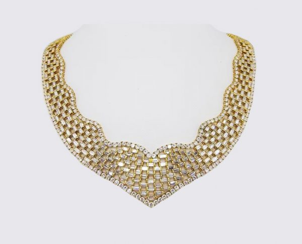 Exceptional Diamond and 18ct Gold Collar Necklace; A stunning flexible collar necklace set with baguette-cut diamonds, 52.93 carat total, 18ct yellow gold