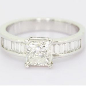 Princess Cut Diamond Engagement Ring; 1.70ct princess-cut diamond, four-claw set, accented with 0.57ct baguette-cut diamond set shoulders, 18ct white gold.