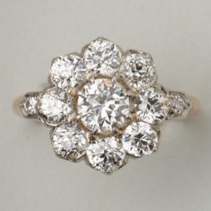 Antique Edwardian Old Cut Diamond Floral Cluster Ring; 18ct yellow gold and platinum cluster ring set with old-cut diamonds, 2.75 carats, France, Circa 1910