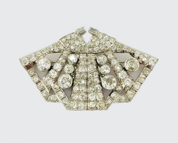 6.50ct Diamond Double Clip Butterfly Brooch; crafted from platinum, In the form of a geometric butterfly. Total diamond weight: 6.50 carats